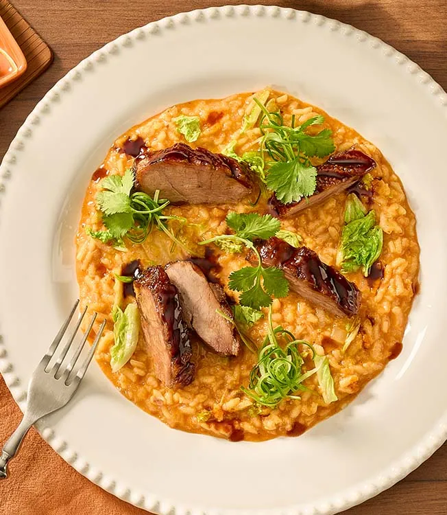 Kimchi-risotto met krokante ganzenborst
