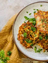 Pannenkoekjes van wortel en knolselderij met kruiden
