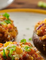 Met quinoa gevulde paddenstoelen