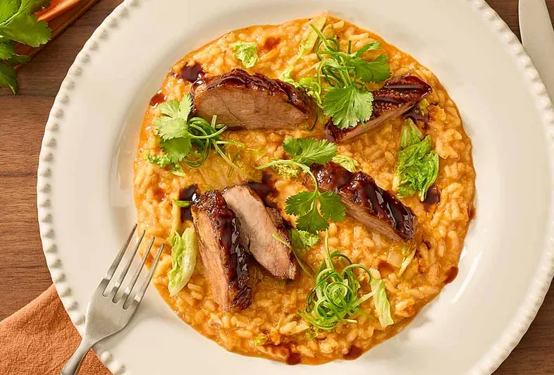 Kimchi-risotto met krokante ganzenborst