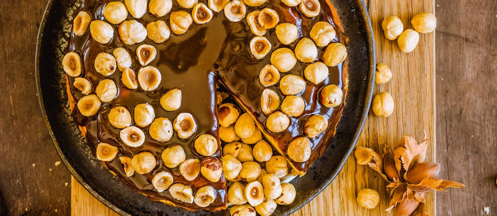 Pompoencheesecake met cranberry’s, karamel en hazelnoten