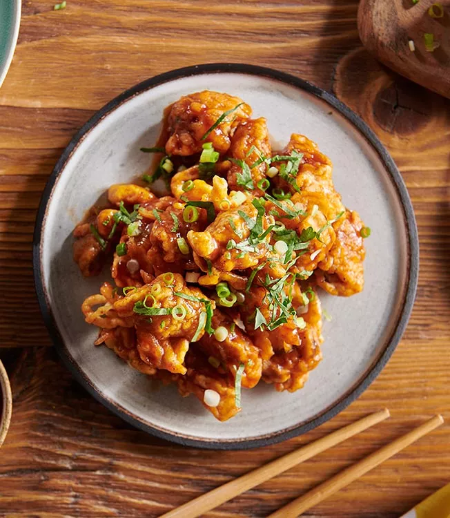 Krokante mosselen in ‘buffalo style’ met ponzu- en chiliglazuur